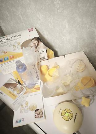 Молоковідсмоктувач medela swing maxi
