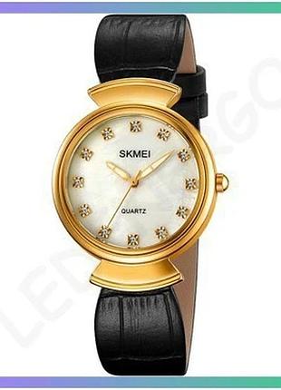 Женские часы skmei 2165 золотистые черные белые кварцевые с кожаным ремешком водонепроницаемые 30м sku_aber_1080-2601