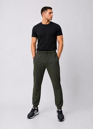 Спортивные штаны на манжете зелений xl