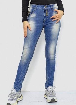 Жіночі прилягаючі джинсові штани низької посадки з еластичними вставками та ефектом зношуваності