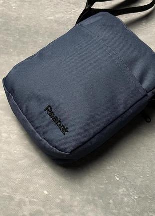 Борсетка reebok синяя 600д черное лого #