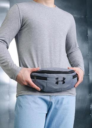 Бананка under armour сіра, чорне лого #