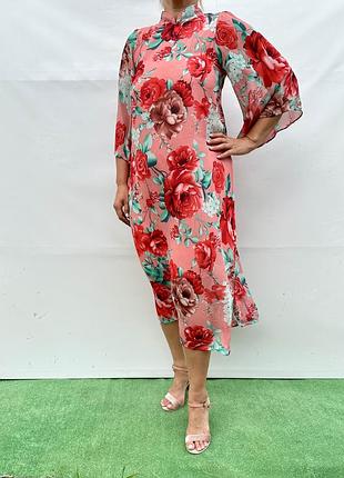 Яскрава шифонова мідісукня з квітковим принтом від бренду neesee's dresses