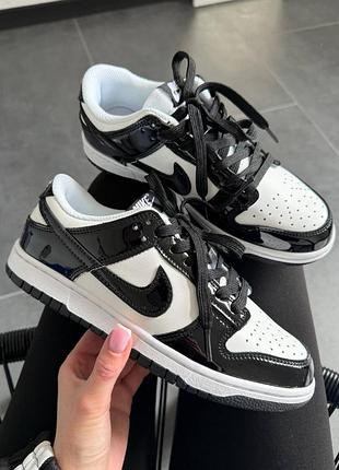 Nike dunk low black white patent