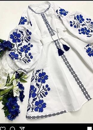 Вишита сукня міді