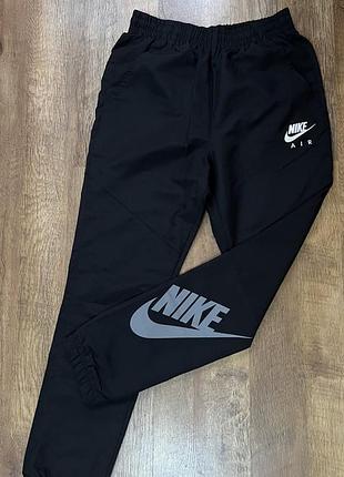 Нейлонові штани nike
