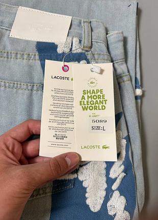 Джинси lacoste