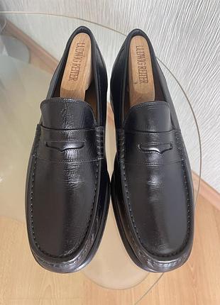 Чоловічи пені лофери від clarks в чорному кольорі