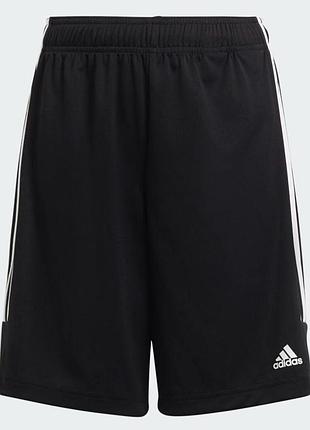 Чорні спортивні шорти adidas із білим логотипом на штанині та світлими смужками збоку на 9-10 років