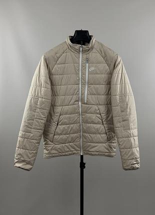 Чоловіча куртка nike therma-fit legacy puffer бежевого кольору. розмір - с