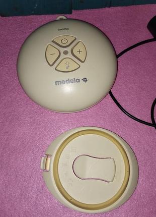 Электрический молокоотсос medela swing двухфазный, лишь блок питания и сам мотор.