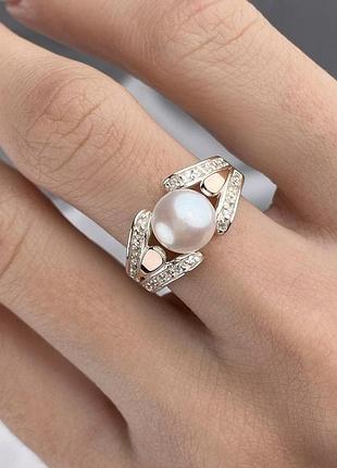Серебярное кольцо с жемчугом и золотыми вставками 0334.10