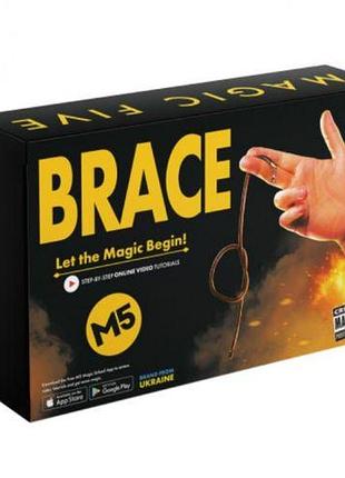 Устройство для демонстрации фокусов и трюков в игровой форме magic five – brace