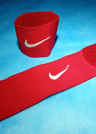 Футбольные фиксаторы для щитков (держатели щитков / guard stays) nike. аксессуар для надежной фиксации футбольных щитков во время тренировок и матчей.