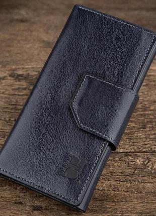 Добротный вертикальный клатч унисекс на хлястике с магнитом grande pelle 11221 синий