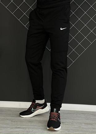 Демісезонні штани чорні nike білий лого (двонитка)