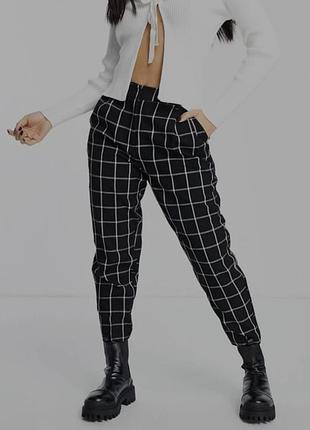 Женские брюки в клетку