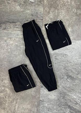 Нейлонові штани nike reflective