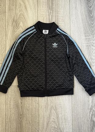 Спортивна кофта (олімпійка) бренду adidas originals сіро-чорного кольору з монограмним принтом із логотипів на 5-6 рочків