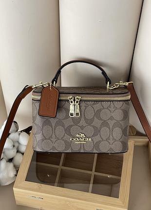 Сумка жіноча coach ava crossbody bag бежевий є