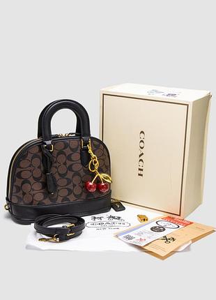 Женская кожаная сумка coach sierra satchel с фирменной канвой коричневая 26 х 20 х 12