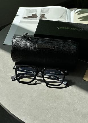 Стильні окуляри chrome hearts з прозорими лінзами та чорною оправою 53/21/151