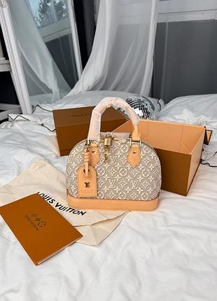 Louis vuitton alma bb monogram denim cream 24x17x11