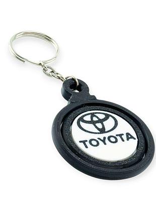 Брелок toyota "атом" чорно-білий