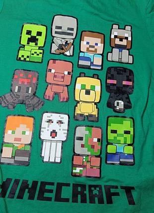 Ярко-зеленая детская футболка minecraft с коротким рукавом и принтом популярных персонажей игры в виде пиксельных минифигурок