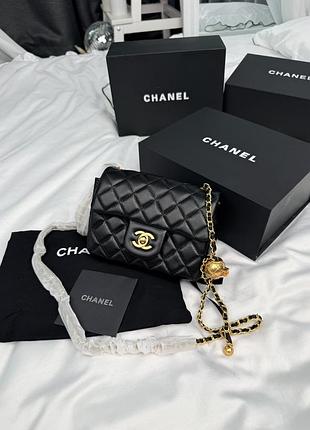 Chanel mini 17 classic flap bag in black with gold