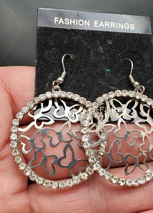 Стоковые серьги из америкы