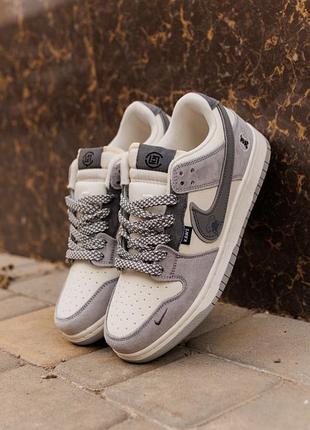 Nike sb dunk × kaws
• grey / cream •