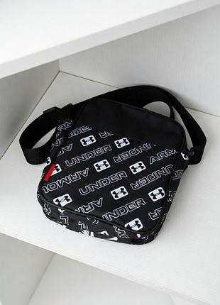 Барсетка чорна принтована under armour через плече
