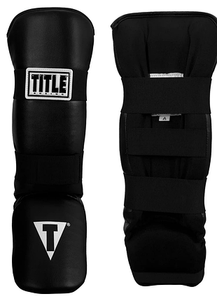 Захист гомілки та стопи title boxing vinyl shin-instep guards 2.0 - чорний/adult, для секції, залу та змагань, для тайського боксу