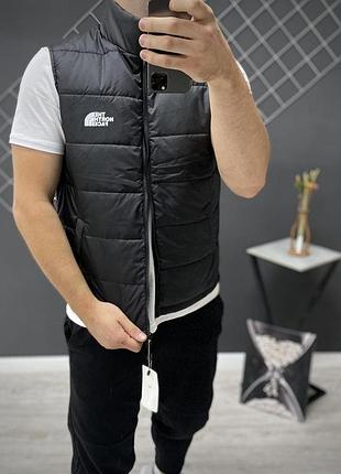 Жилетка чорна tnf 3