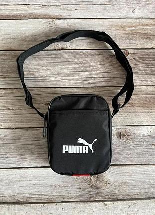 Чорна сумка puma через плече — стриманий міський стиль без зайвих деталей