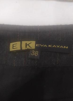 Спідниця з кишенями 38 р 5