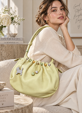 Шкіряна вінтажна сумка radley зелена сумка фірмова брендова з підвісом з брелоком кожаная винтажная сумка radley зеленая с подвесом с брелком