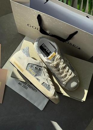Golden goose super-star in silver glitter with ice-gray star and inserts