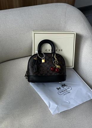 Сумка coach sierra satchel in signature canvas brown