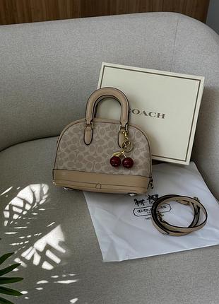 Сумка coach sierra satchel in signature canvas beige