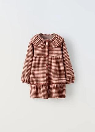 Дитяча трикотажна сукня в клітинку від бренду zara