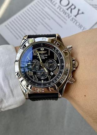 Годинник breitling chronomat chronograph featuring a black dial