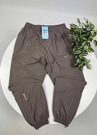 Нейлонові штани nike nocta чорні