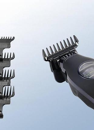 Триммер с док-станцией и 4 сменными насадками vgr v-880t black external rotor motor черный