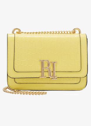 Желтая сумка кросс-боди  river island с тисненым фирменным узором и крупной золотистой фурнитурой