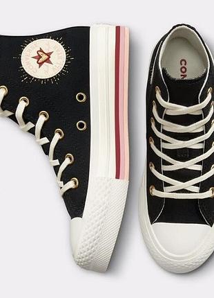 Високі чорні кеди converse