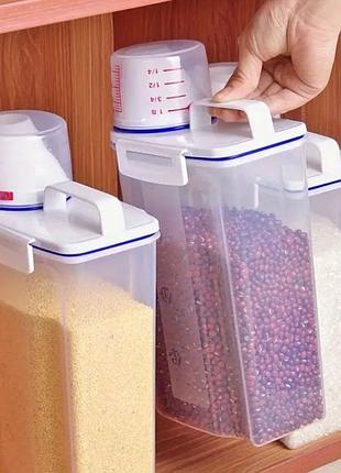 Контейнер для сыпучих продуктов с дозатором и мерным колпачком 2л белый