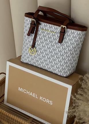 Сумка жіноча michael kors jet set travel extra-small top-zip tote білий є
