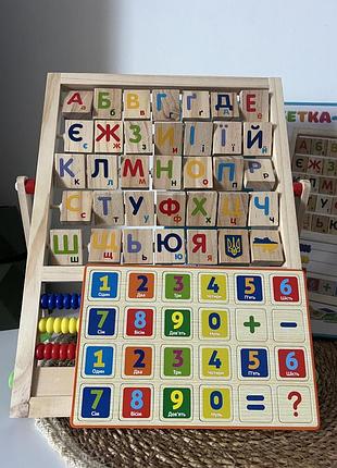 Дерев'яна іграшка мольберт md 0890 абетка-мольберт, абетка, рахівниця, годин.,цифри